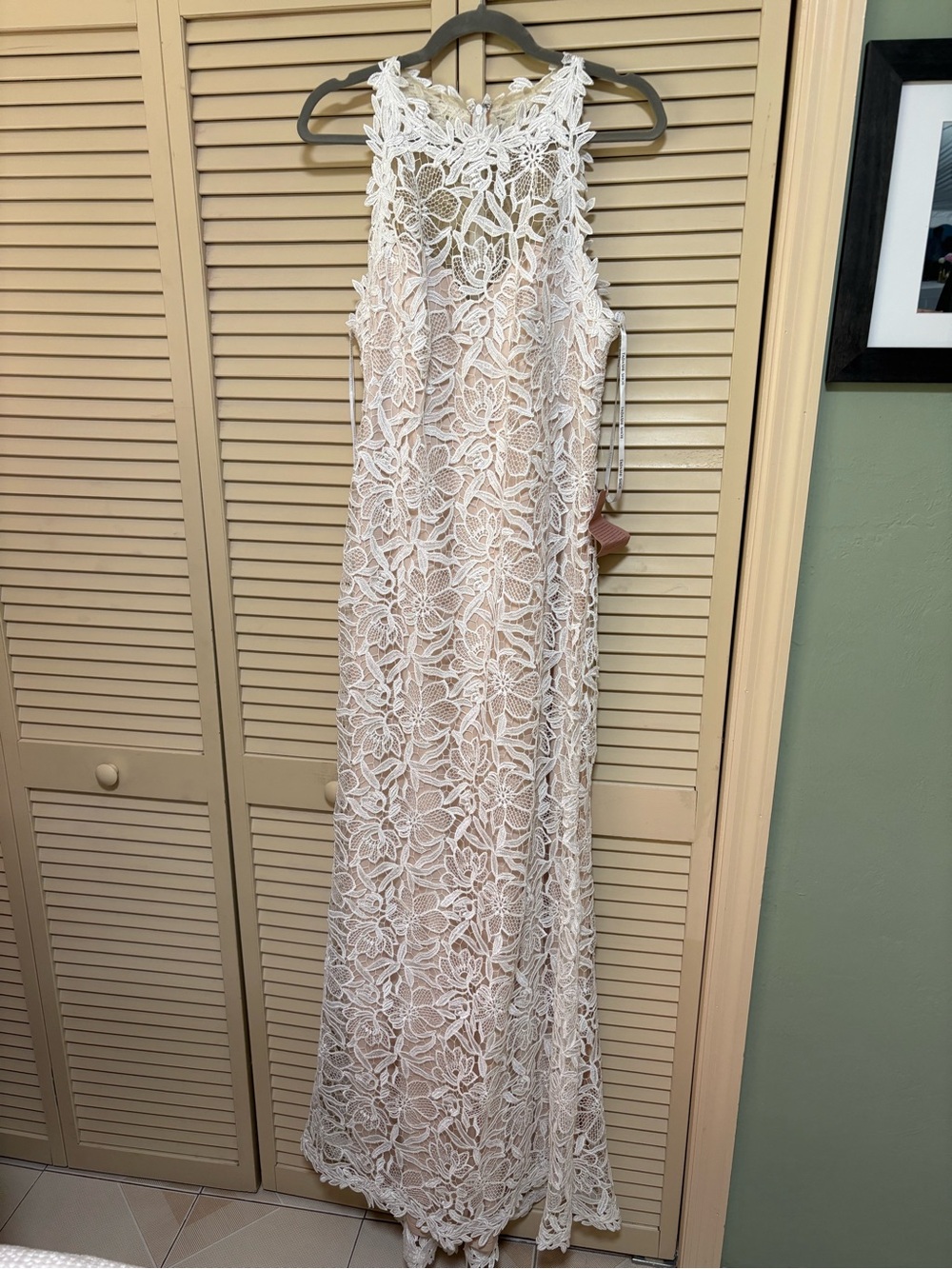 Size 14 Anthropologie wedding dress. Never altered or worn.